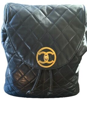 CHANEL Black Quilted Leather Backpack with Gold CC Emblem